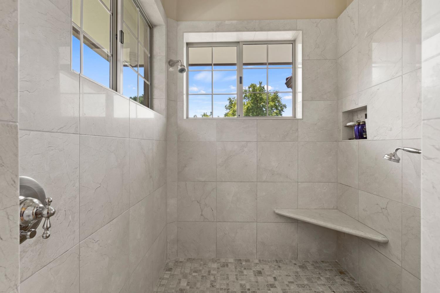 10676 Wilton Road Elk Grove, CA 95624 - Photo 46 of 71 a bathroom with a shower