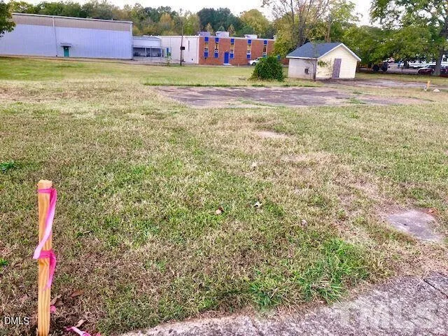 a view of a yard with an outdoor space
