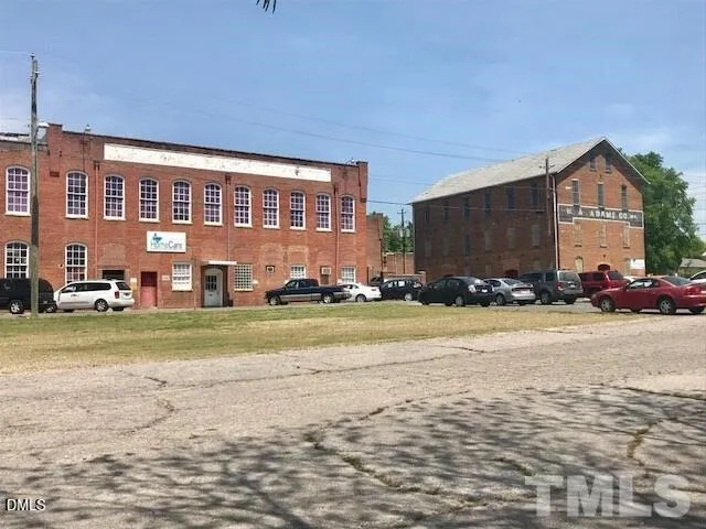 a front view of house with outdoor space