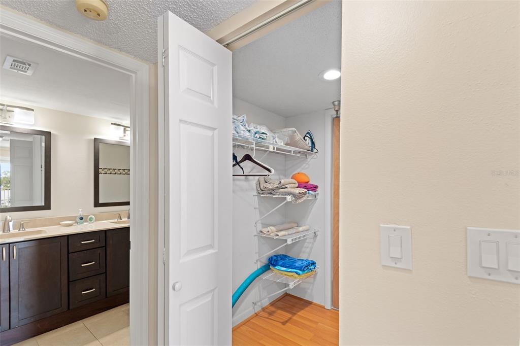 13440 Gulf Lane, Unit 202 Madeira Beach, FL 33708 - Photo 24 of 41 a bathroom with a sink and a mirror