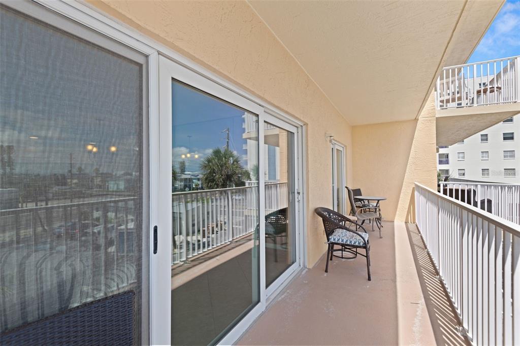 13440 Gulf Lane, Unit 202 Madeira Beach, FL 33708 - Photo 26 of 41 a view of balcony with furniture