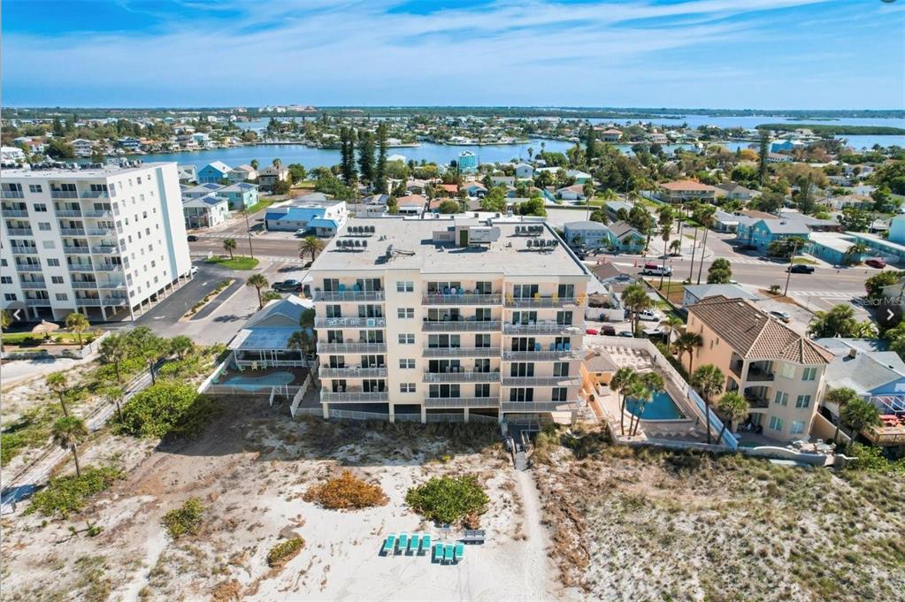 13440 Gulf Lane, Unit 202 Madeira Beach, FL 33708 - Photo 40 of 41 a view of a city with tall buildings