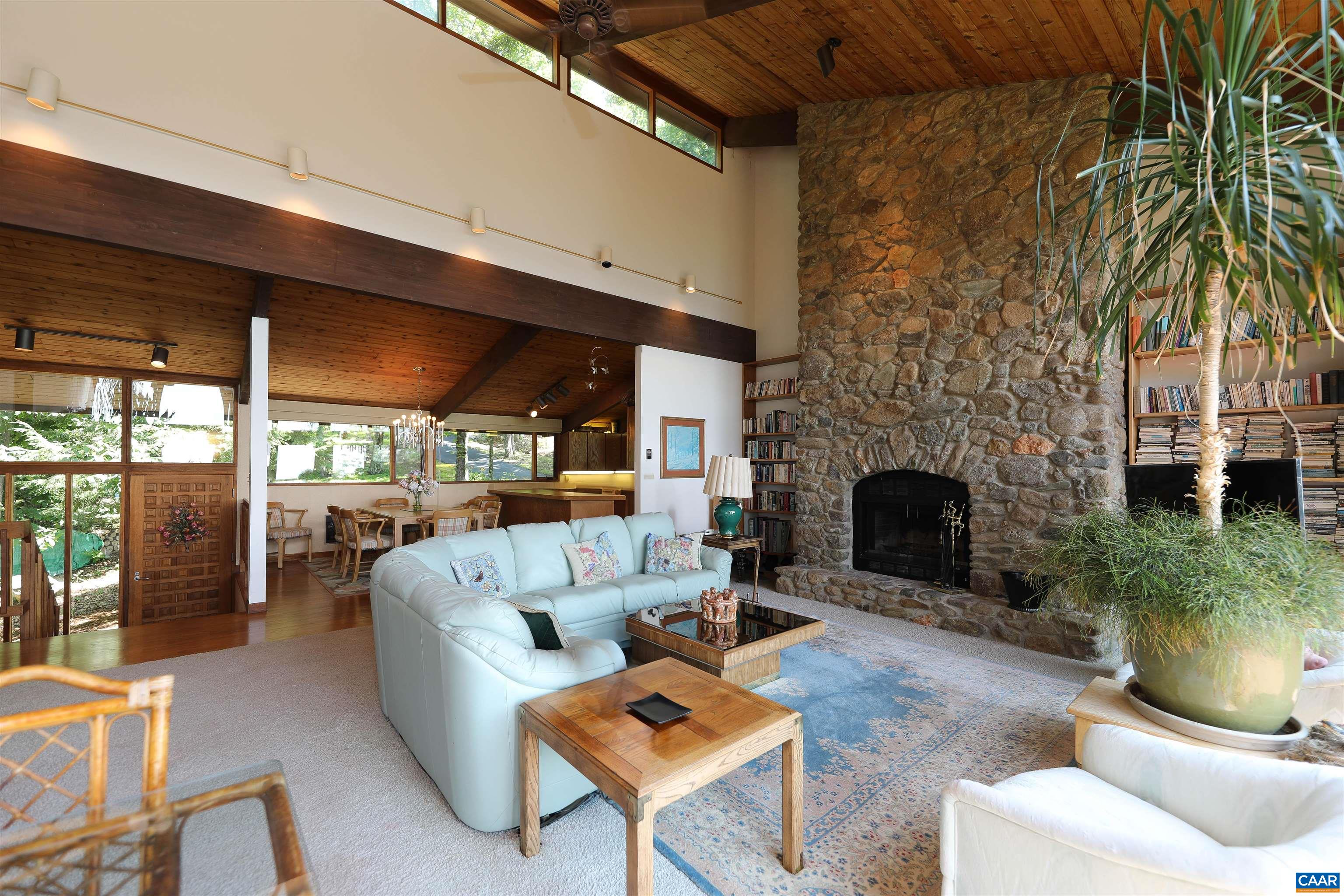 383 Cedar Drive Wintergreen, VA 22967 - Photo 18 of 47 a living room with furniture and a fireplace