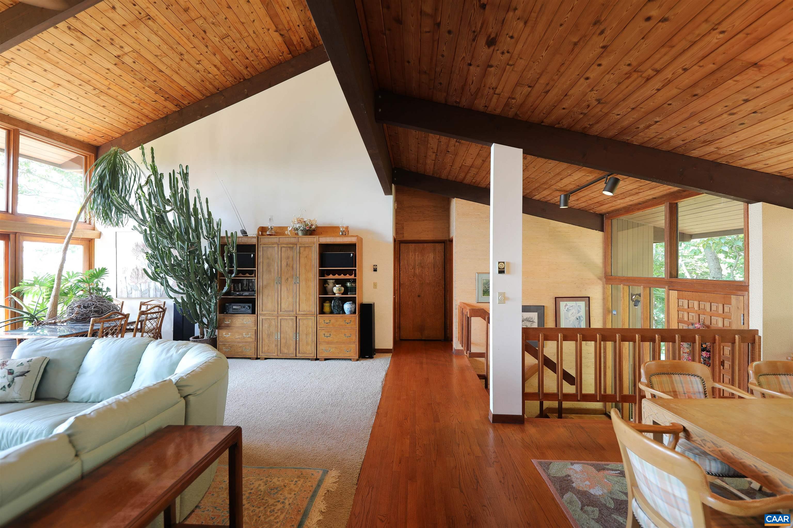 383 Cedar Drive Wintergreen, VA 22967 - Photo 19 of 47 a outdoor living space with furniture and wooden floor