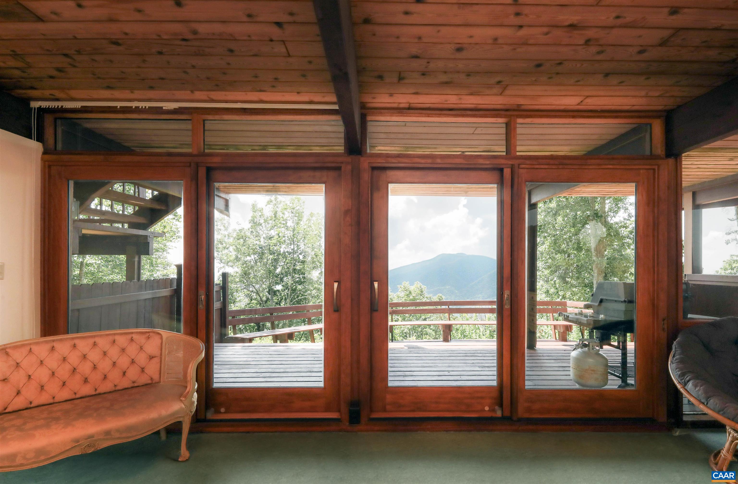 383 Cedar Drive Wintergreen, VA 22967 - Photo 33 of 47 a bedroom with furniture and a large window