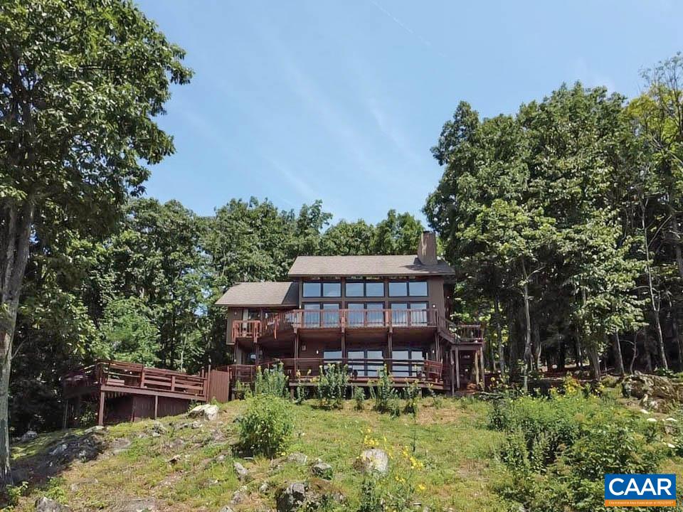 383 Cedar Drive Wintergreen, VA 22967 - Photo 42 of 47 a view of a house with a yard and sitting area