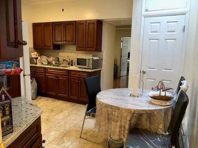 $879,000 | 74-03 Myrtle Avenue | Glendale