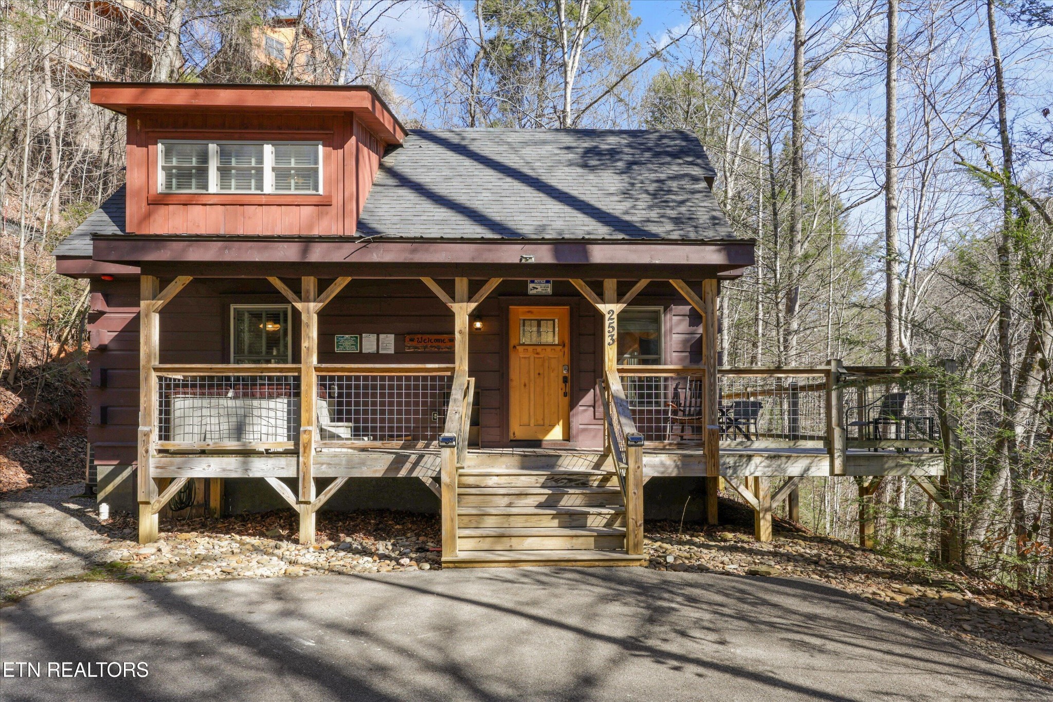 253 Cartertown Road Gatlinburg, TN 37738 - Photo 1 of 30 a view of a house with wooden fence