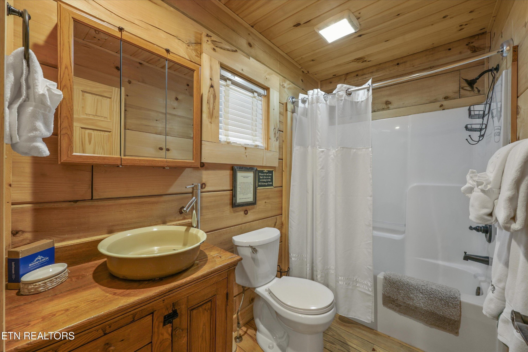 253 Cartertown Road Gatlinburg, TN 37738 - Photo 17 of 30 a bathroom with a sink toilet and shower