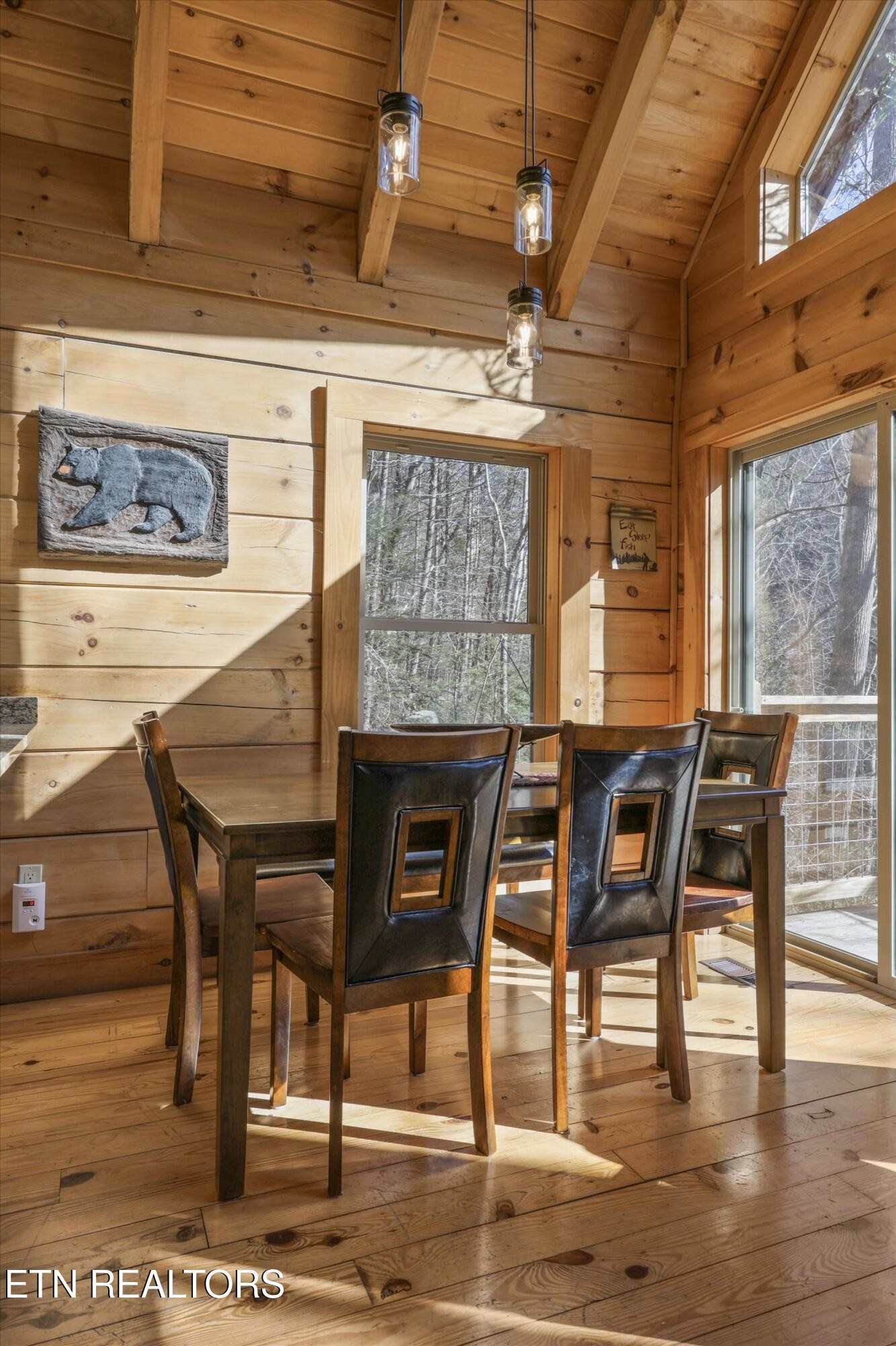 253 Cartertown Road Gatlinburg, TN 37738 - Photo 10 of 30 a view of a dining room with furniture and wooden floor