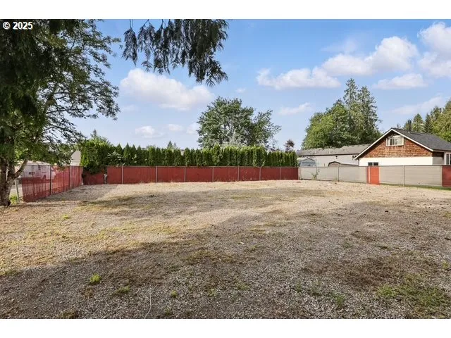 a view of a house with a swimming pool and a outdoor space