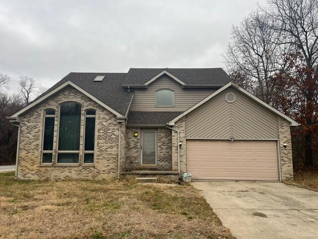 3836 West 25th Avenue Gary, IN 46404 - Photo 1 of 41 a house with trees in the background