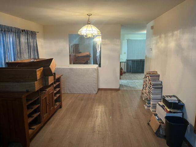 3836 West 25th Avenue Gary, IN 46404 - Photo 13 of 41 a view of empty room with wooden floor