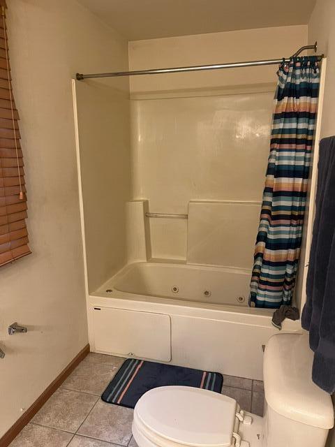 3836 West 25th Avenue Gary, IN 46404 - Photo 33 of 41 a bathroom with a toilet and a shower