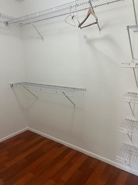 132 South Cypress Road, Unit 523 Pompano Beach, FL 33060 - Photo 12 of 25 a view of a room with racks on the wall