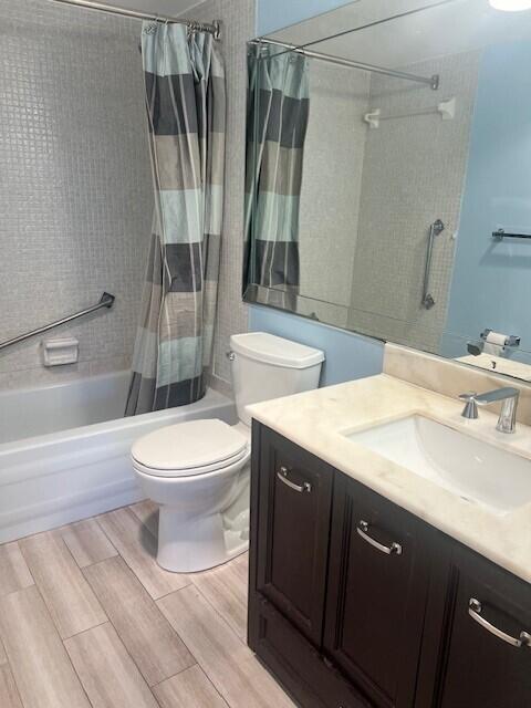 132 South Cypress Road, Unit 523 Pompano Beach, FL 33060 - Photo 14 of 25 a bathroom with a sink a toilet and shower