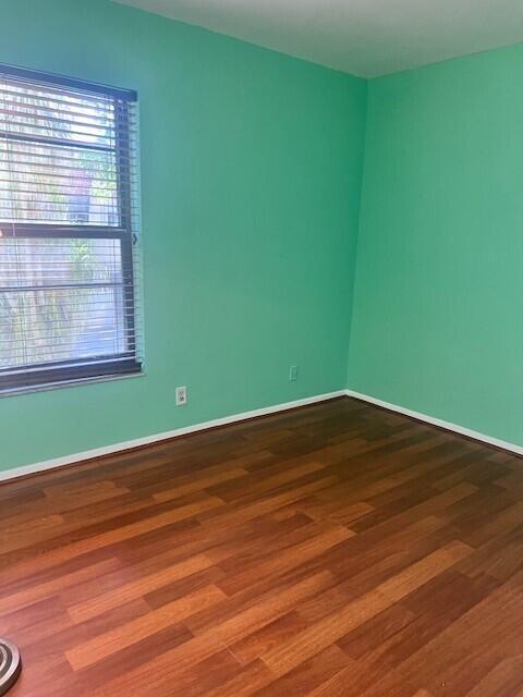 132 South Cypress Road, Unit 523 Pompano Beach, FL 33060 - Photo 15 of 25 a view of a room with wooden floor and a window