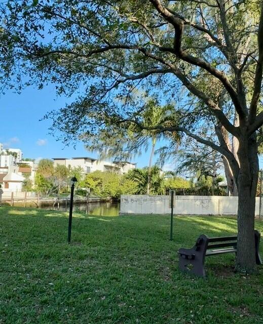 132 South Cypress Road, Unit 523 Pompano Beach, FL 33060 - Photo 21 of 25 a view of a park with large trees