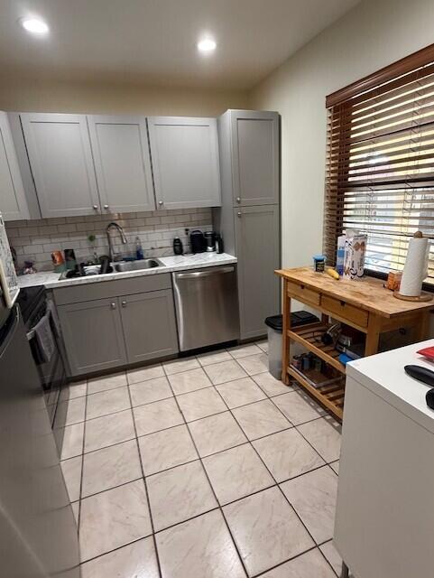 132 South Cypress Road, Unit 523 Pompano Beach, FL 33060 - Photo 5 of 25 a kitchen with a cabinets and appliances