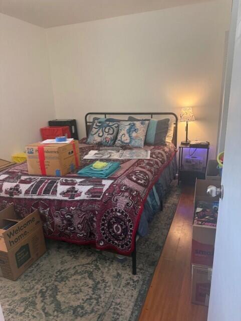132 South Cypress Road, Unit 523 Pompano Beach, FL 33060 - Photo 8 of 25 a bedroom with a bed next to a walk in closet