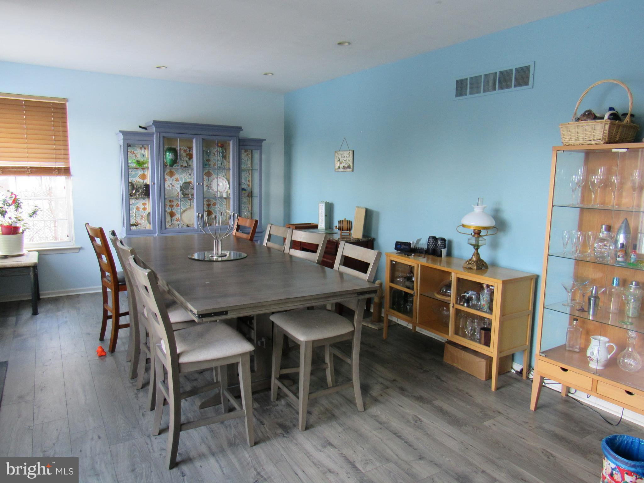 17 Wilt Road Bechtelsville, PA 19505 - Photo 12 of 31 a view of a dining room with furniture and wooden floor