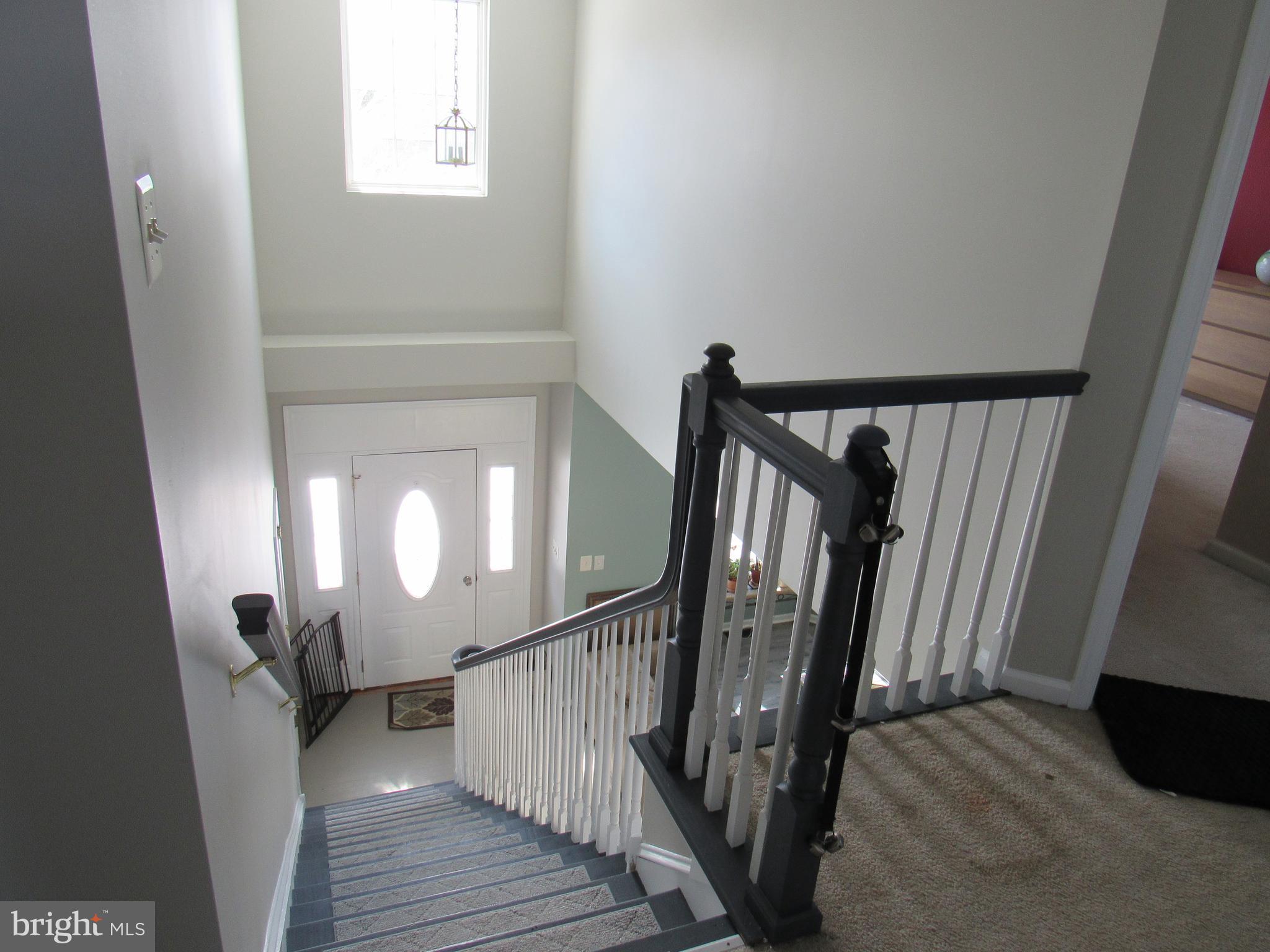 17 Wilt Road Bechtelsville, PA 19505 - Photo 19 of 31 a view of a hallway with wooden floor and stairs