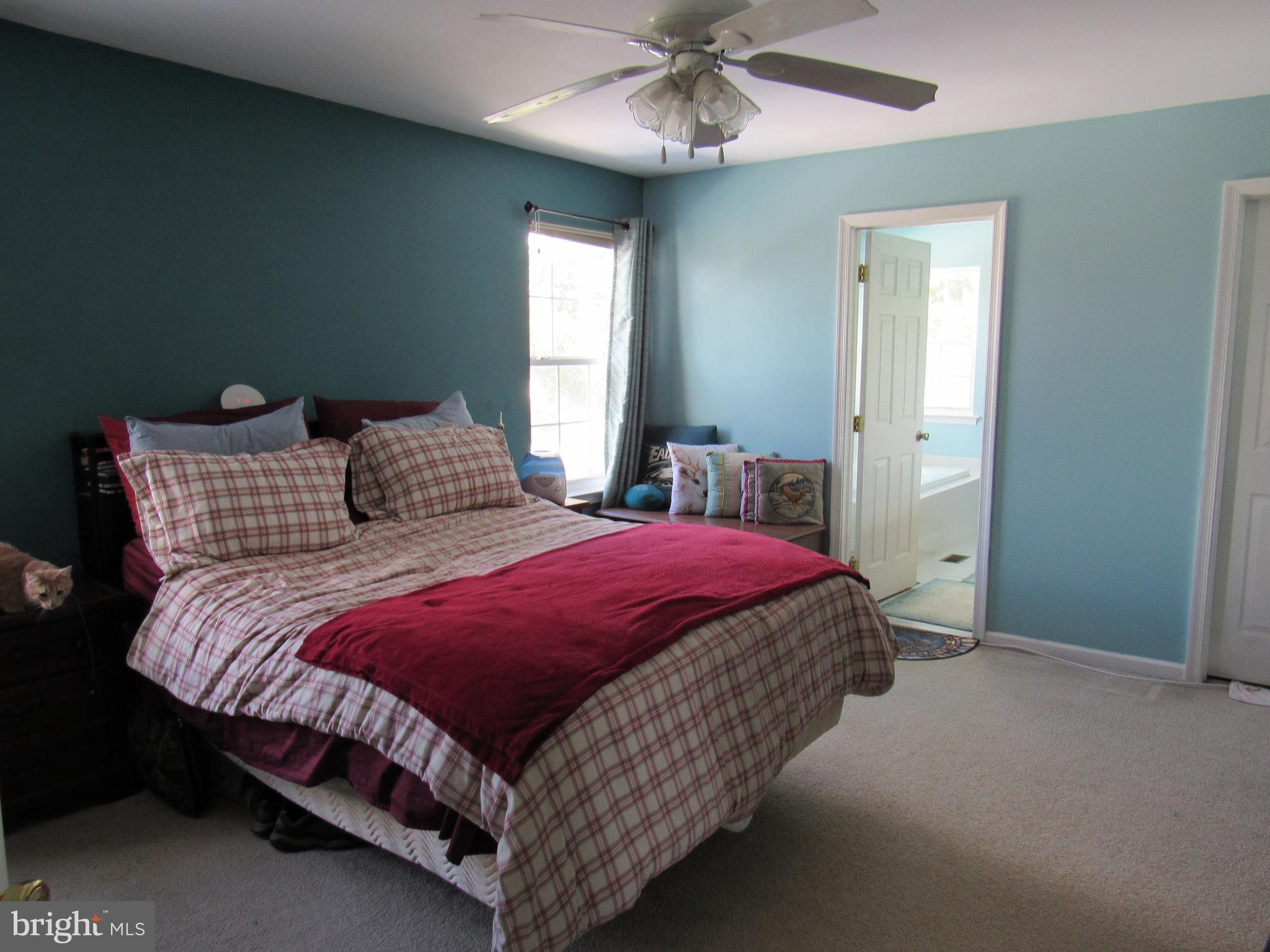 17 Wilt Road Bechtelsville, PA 19505 - Photo 22 of 31 a bedroom with a bed and window