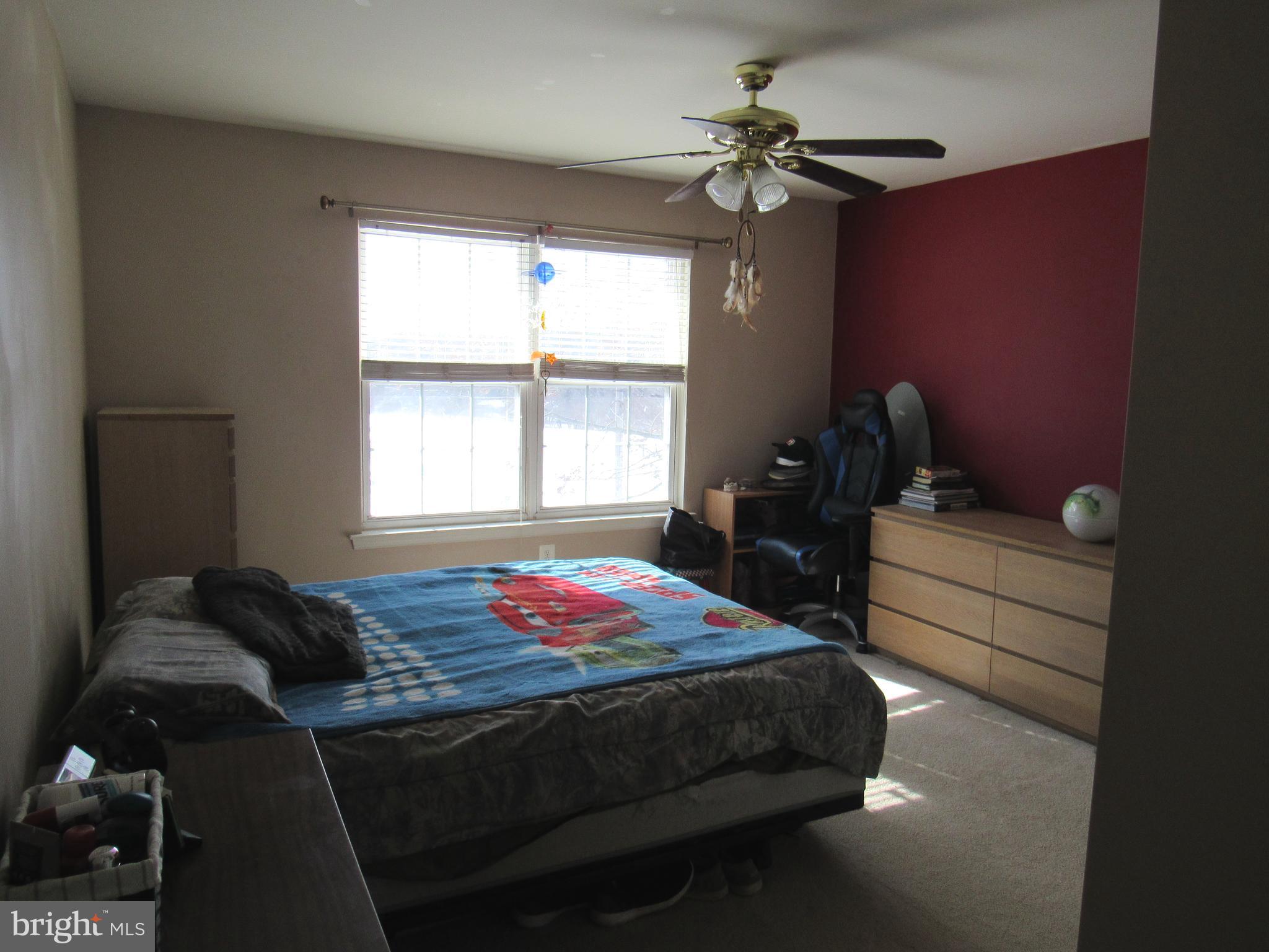 17 Wilt Road Bechtelsville, PA 19505 - Photo 25 of 31 a bedroom with a bed and window