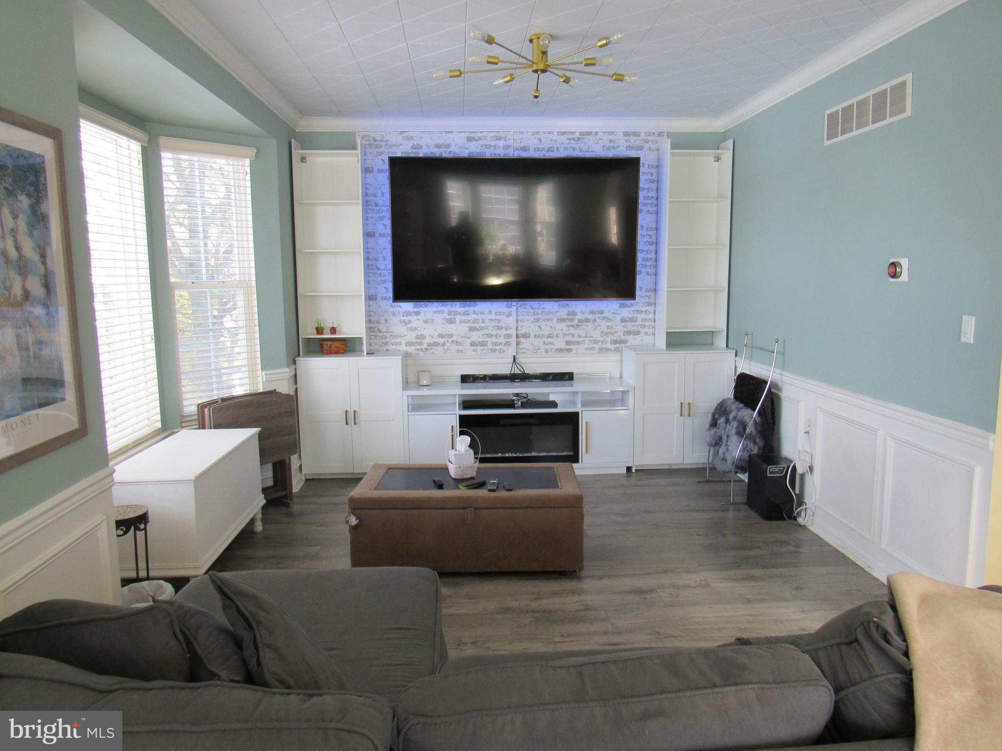 17 Wilt Road Bechtelsville, PA 19505 - Photo 10 of 31 a living room with furniture and a flat screen tv