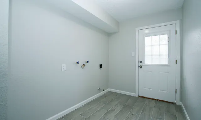 a view of small space with wooden floor