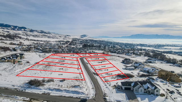 681 Cherry Ridge Lane, Unit 45 Richmond, UT 84333 - Photo 4 of 10 Snowy aerial view with a mountain view