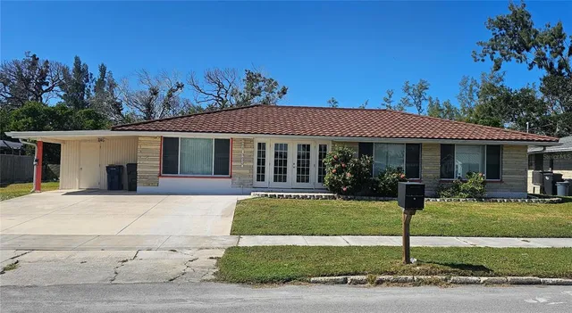 front view of a house with a yard