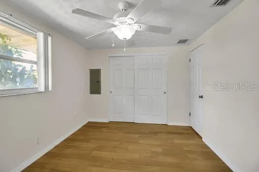 a view of a pathway of a house with backyard