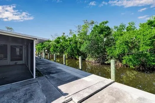 a view of a livingroom with a floor to a window