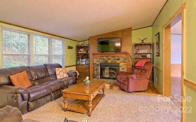 a kitchen with cabinets a sink and white appliances
