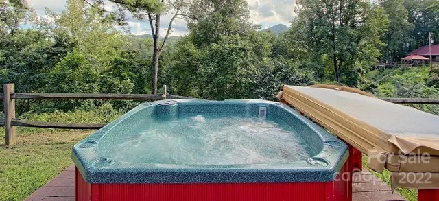 a view of swimming pool from a balcony