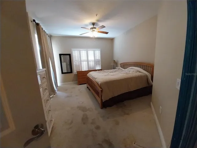 a bathroom with a toilet and a sink
