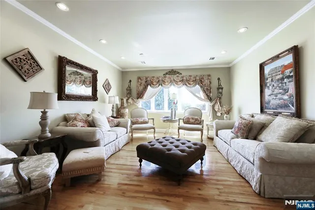 a living room with furniture and a rug