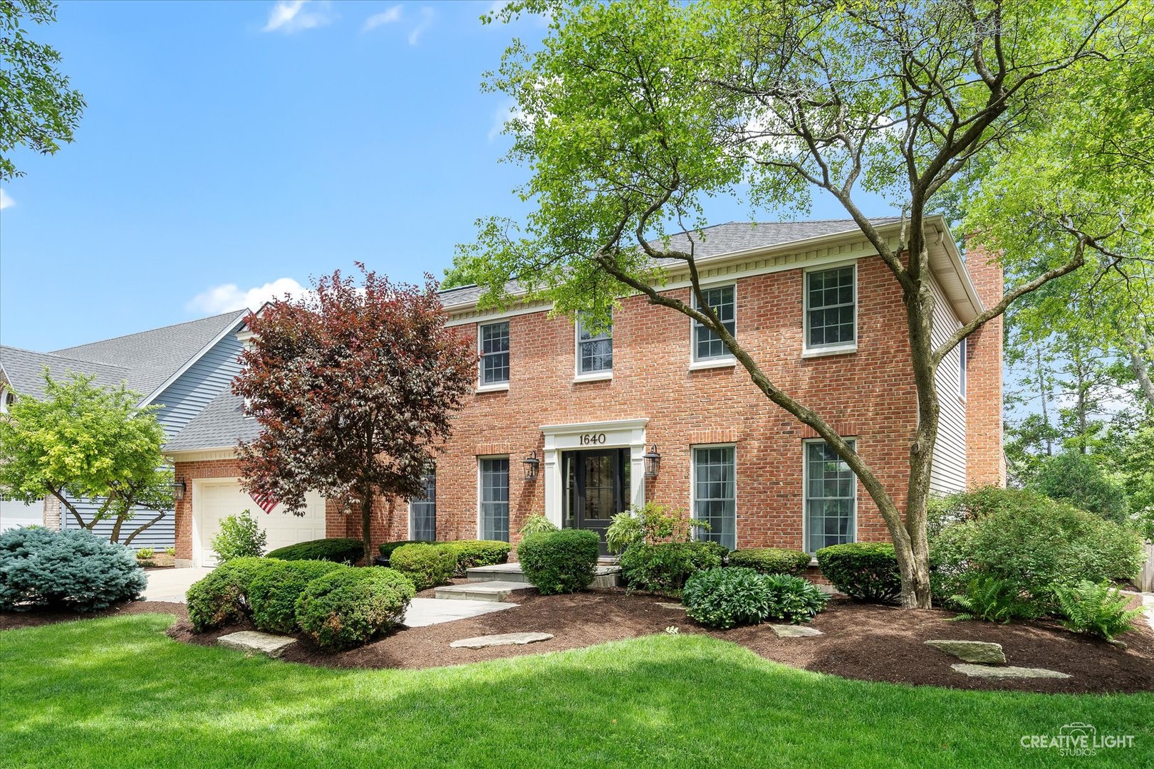 1640 Riparian Drive Naperville, IL 60565 - Photo 1 of 1 front view of a house with a yard
