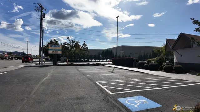 a view of a building with a street