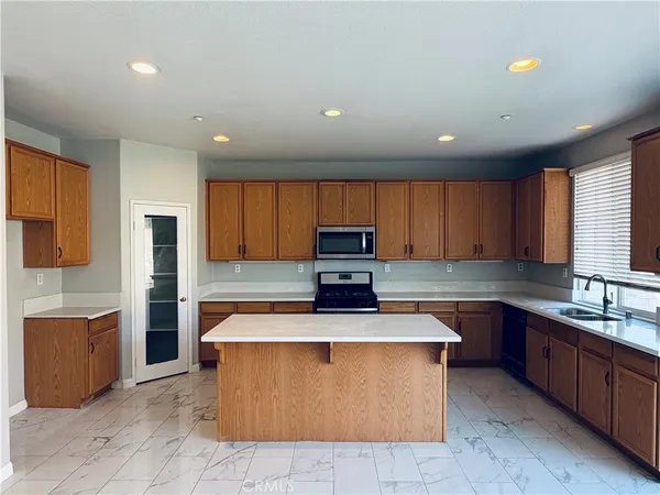 a bathroom with a mirror and a sink