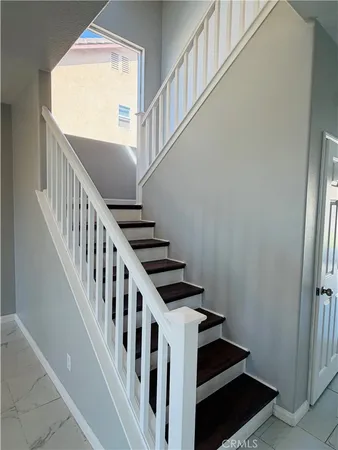a view of room with window and ceiling fan