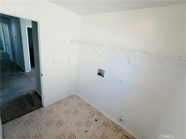 a large bathroom with a granite countertop sink a toilet a vanity and mirror