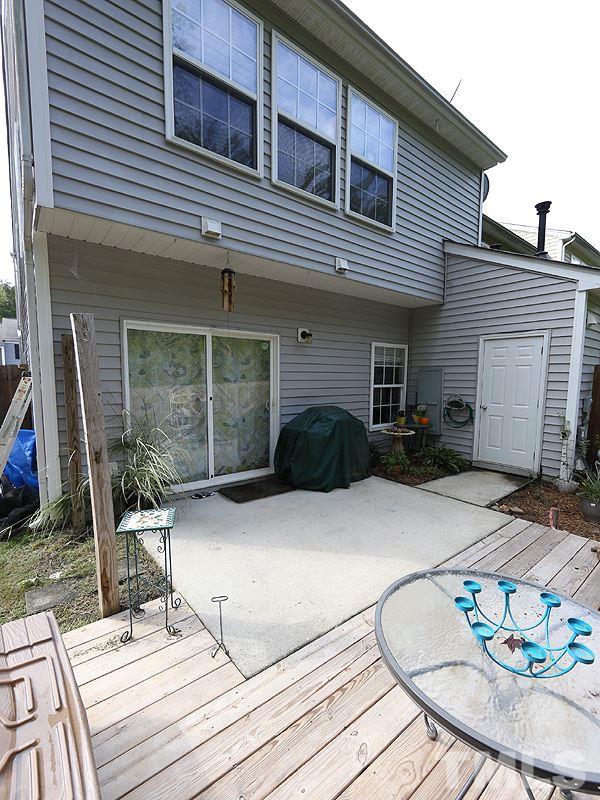 8208 Clasara Circle Raleigh, NC 27613 - Photo 14 of 19 a view of a house with backyard