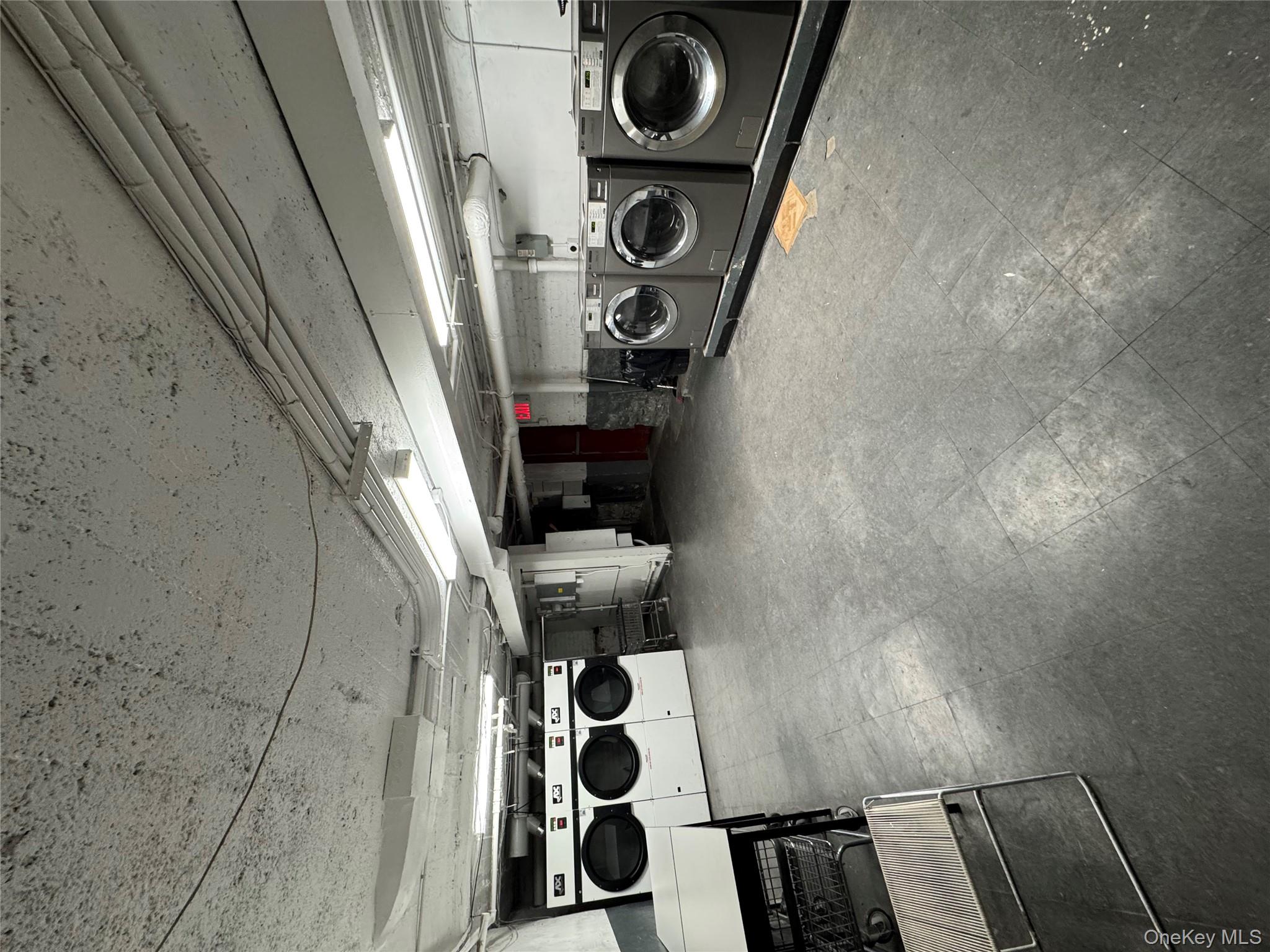 2922 Barnes Avenue, Unit 6D Bronx, NY 10467 - Photo 13 of 19 a view of a room with gym equipment