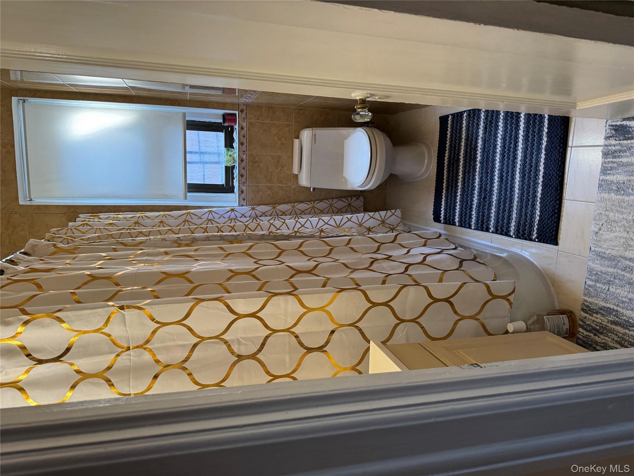 2922 Barnes Avenue, Unit 6D Bronx, NY 10467 - Photo 7 of 19 a view of a bathroom