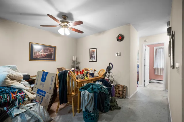 a living room with lots of gym equipment