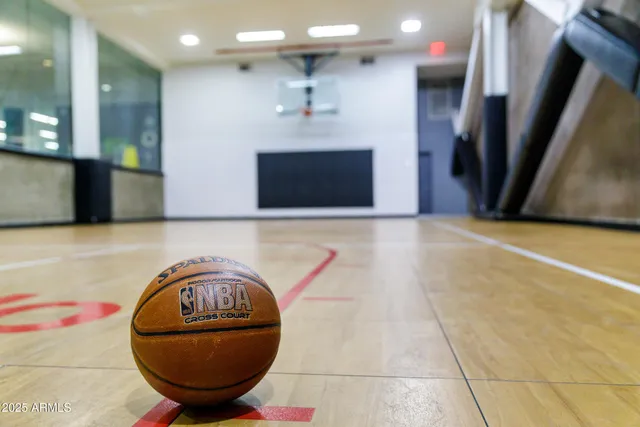 a front view of building with yard