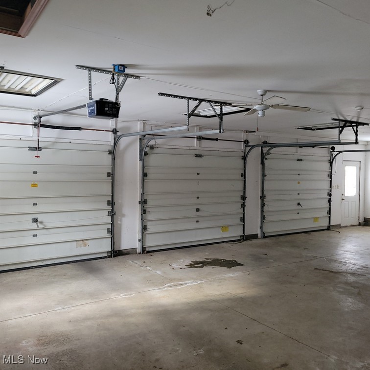 38227 Chestnut Ridge Road Elyria, OH 44035 - Photo 29 of 36 Garage with a garage door opener