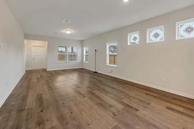 an empty room with windows